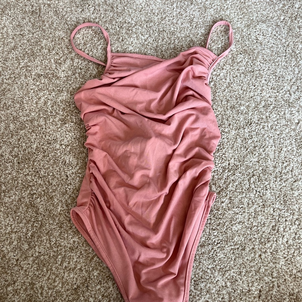 Pink bodysuit